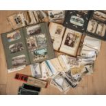 A collection of postcard and photography ephemera, comprising of a book of post cards, two boxes