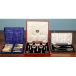 Three boxes of cutlery to include a W. F Johnson red boxed set of seven plated spoons, a black boxed