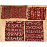 Four Kilim cushion cases, the largest 64cm x 30cm; the pair are 46cm x 50cm (each) and the