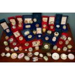 A large collection of assorted Halcyon Days enamel trinket boxes including twenty-one trinket boxes,