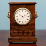 A sedan chair clock, in a later mahogany case with lion head detail to the sides, engraved to the