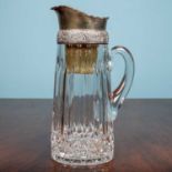 A 19th century glass cordial wine jug, with a decorative silver plated metal collar and lip, 30cm