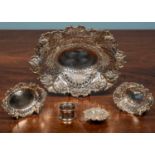 Four silver bon bon dishes, one large (25.5cm) and 3 smaller (12cm, 11cm, 6cm wide) together with