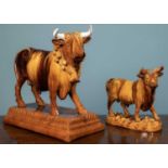 Two Portuguese glazed pottery bulls, one decanter by M Mafra, Caldas, smaller (22cm x 26.5cm),