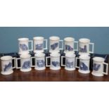 A collection of twelve vintage porcelain Oxford mugs, depicting various Oxford city scapes including