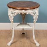 A coalbrookdale style table, marked Jaques London to the wooden surface, white cast iron with a