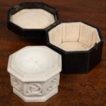 A Victorian mini church font, parian ware, in a black leather case, inscribed 'Pratt & Sons,