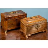 Two tea caddies, the smallest has a handle to the top and opens to reveal a blue velvet interior,