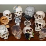A group of various decorative composite skulls the largest approximately 16cm highMinor marks,