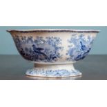 A large blue and white Wedgwood bowl decorated with birds, together with a Wedgwood Basalt teapot, a