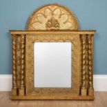 A large giltwood mirror, ornately carved with floral decoration and twisted pillars, 79 x 63cmUsed
