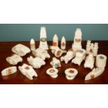 A collection of crested china consisting of various World War I tanks and other vehicles, a ship,