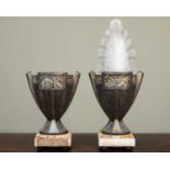 A pair of French style lamp bases, both on a raised marble style stand, each 24cm high (2)Used