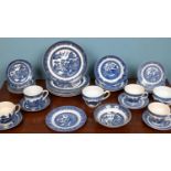 A collection of Willow, Johnson Bros, England Ironstone porcelain, comprising of seven dinner