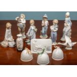 A group of Lladro items consisting of six various figurines; three bells; a small vase; a goose; and