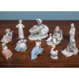 An assortment of various Lladro and Nao ceramics, including five Lladro figures of girls and a