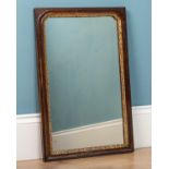 A mahogany framed mirror, with gilt carved wooden detail to the inside of the frame, 57cm h x 36.5cm