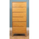 An Ercol Rimini six door tall chest, oak, 58 cm wide x 46cm deep x 143cm highUsed condition with