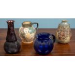 An assortment of vases and jugs comprising of one purple vase, 30cm h; one blue jug, 18cm h; one