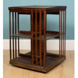 A revolving bookcase, mahogany, 51 x 71cmUsed condition with marks and wear consistent with age.