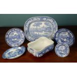 An assortment of English blue and white porcelain comprising of one large tray, two dinner plates, a