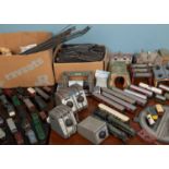 A collection of OO guage model railway items, locomotives and rolling stock, buildings etc, all in