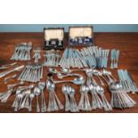 A canteen of Kings Pattern silver plated cutlery, two cased silver condiment sets, two silver