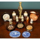 A small group of ceramics to include a Moorcroft vase; a Doulton John Barley Corn jug; a Royal