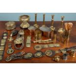 A quantity of metalware consisting of two antique copper jelly moulds; a cast brass and slate