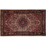 A rug with pink and black floral pattern, 233 x 136cm Used condition