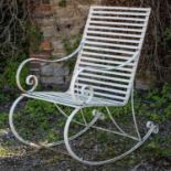 A Victorian-style wrought iron garden rocking chair