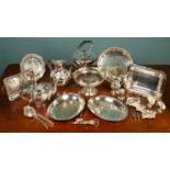 A quantity of silver plated items, to include a tea kettle and stand; a pierced basket; two teapots;