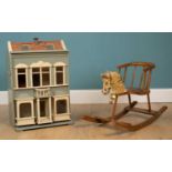 An antique child's rocking horse seat and an old painted doll's house