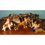 A Royal Dux porcelain group modelled as two pointer dogs and sixteen further china animal figures
