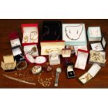 A collection of costume jewellery and watches