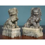 Two Oriental soapstone dogs of fo