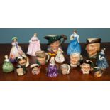 A collection of seventeen Royal Doulton figurines and character jugs