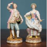Two Meissen STYLE porcelain courtly figures