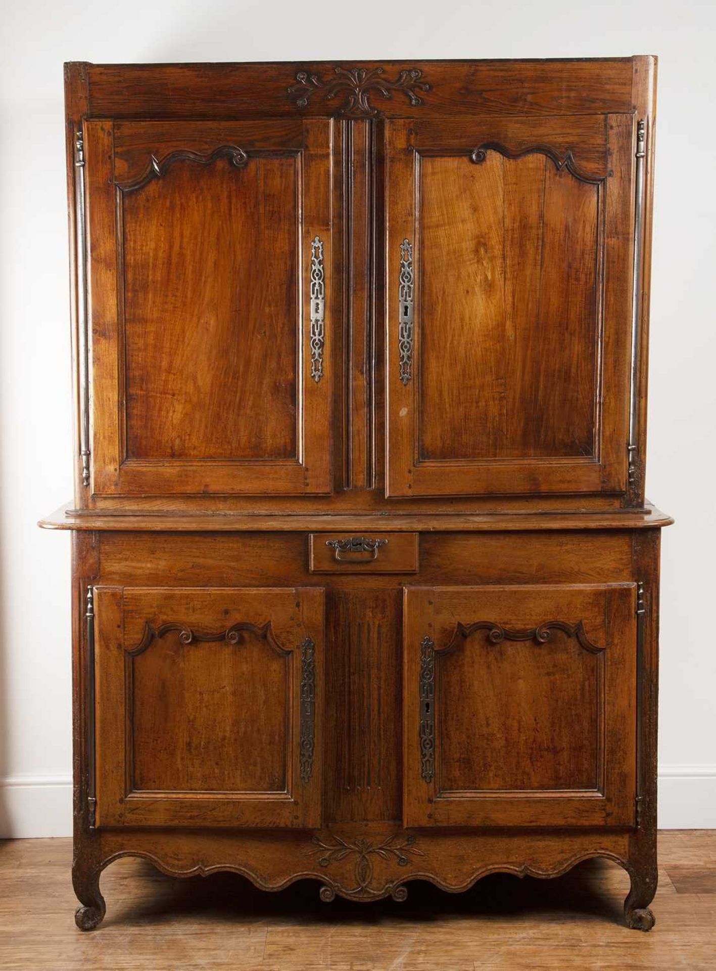 Walnut cabinet in two parts/meuble à deux corps French, late 18th/19th Century, the interior