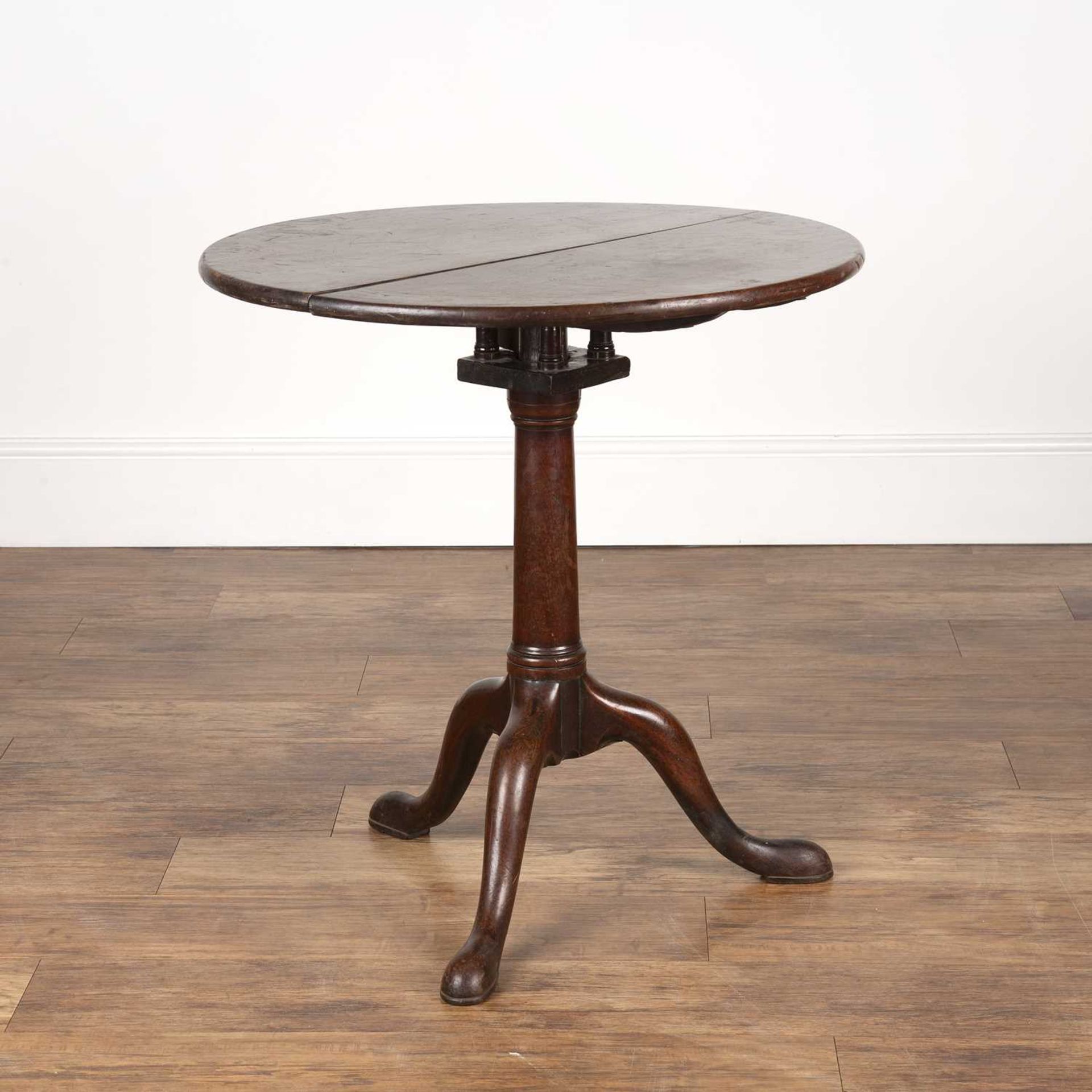 Mahogany tip-up tripod table early 19th Century, with birdcage column and pad feet 68.5cm diameter x