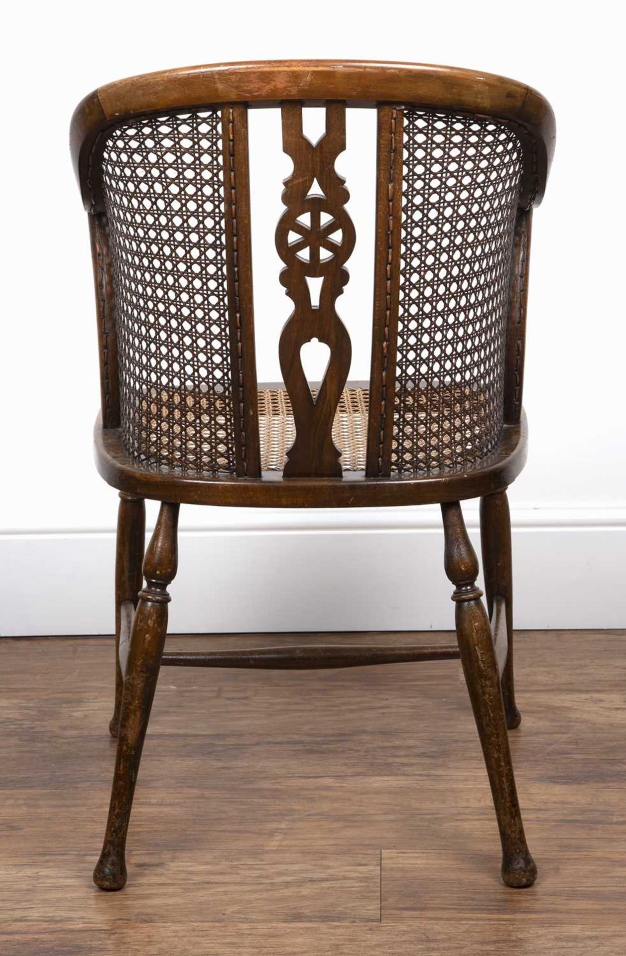 Edwardian bergere caned chair by Arthur Newbery Ltd, beech frame, with pierced wheel splat to the - Image 3 of 3