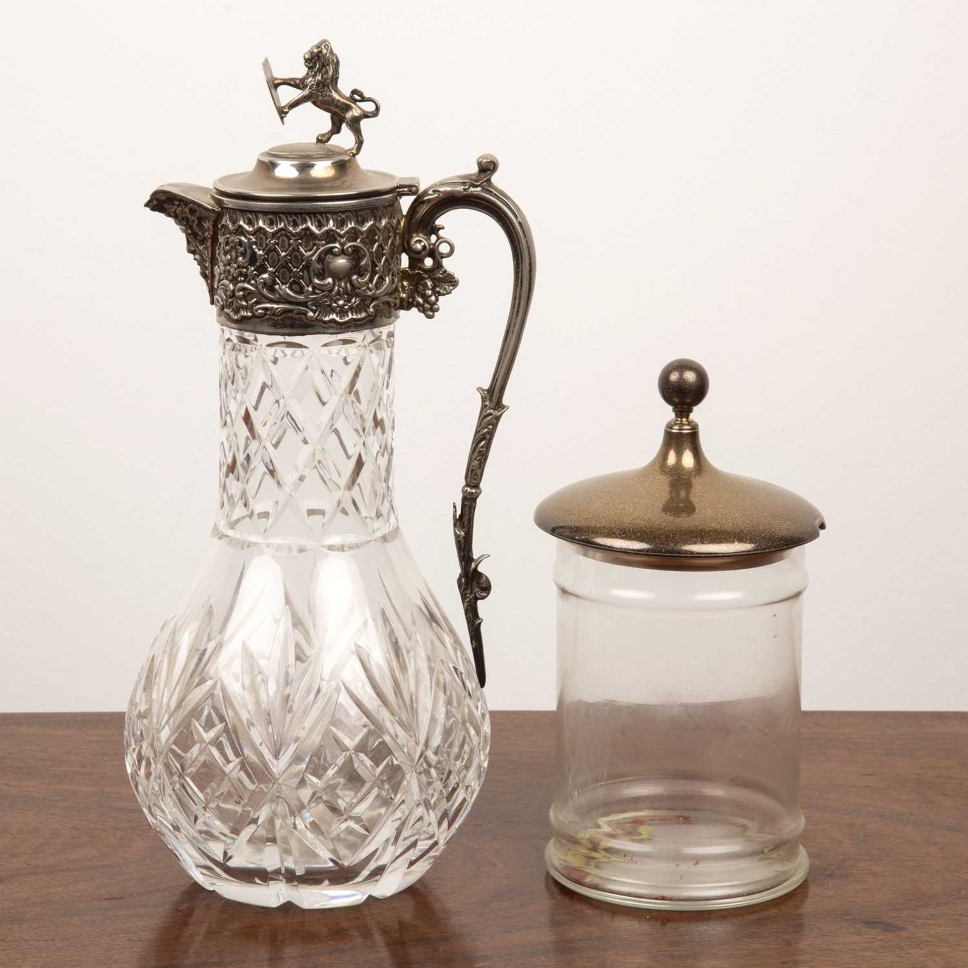 Heavy glass and silver plated claret jug with a lion finial, 30cm high and a silver lidded glass - Image 2 of 2