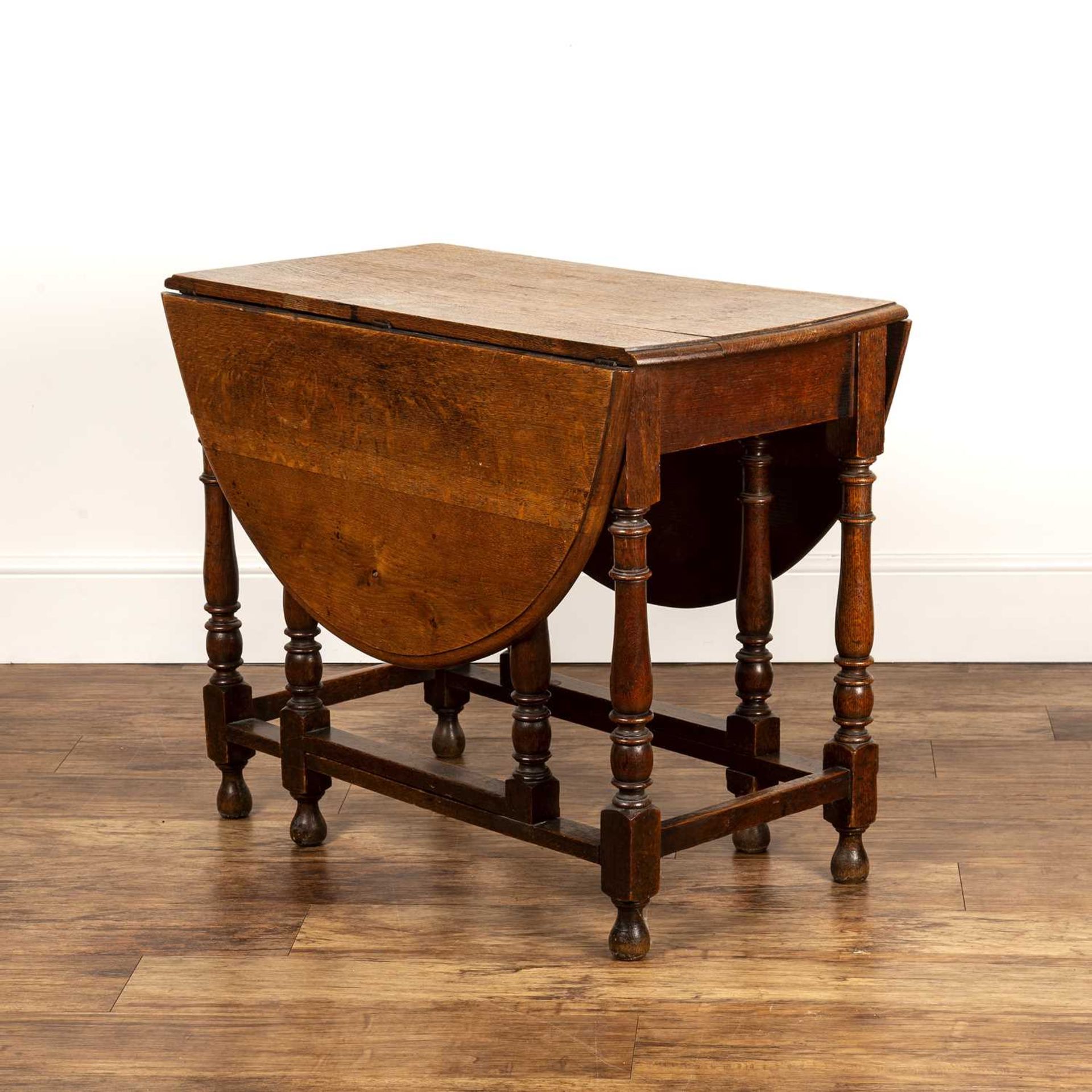 Oak gateleg/drop leaf table 19th Century, standing on ring turned legs, unopened measures 91cm