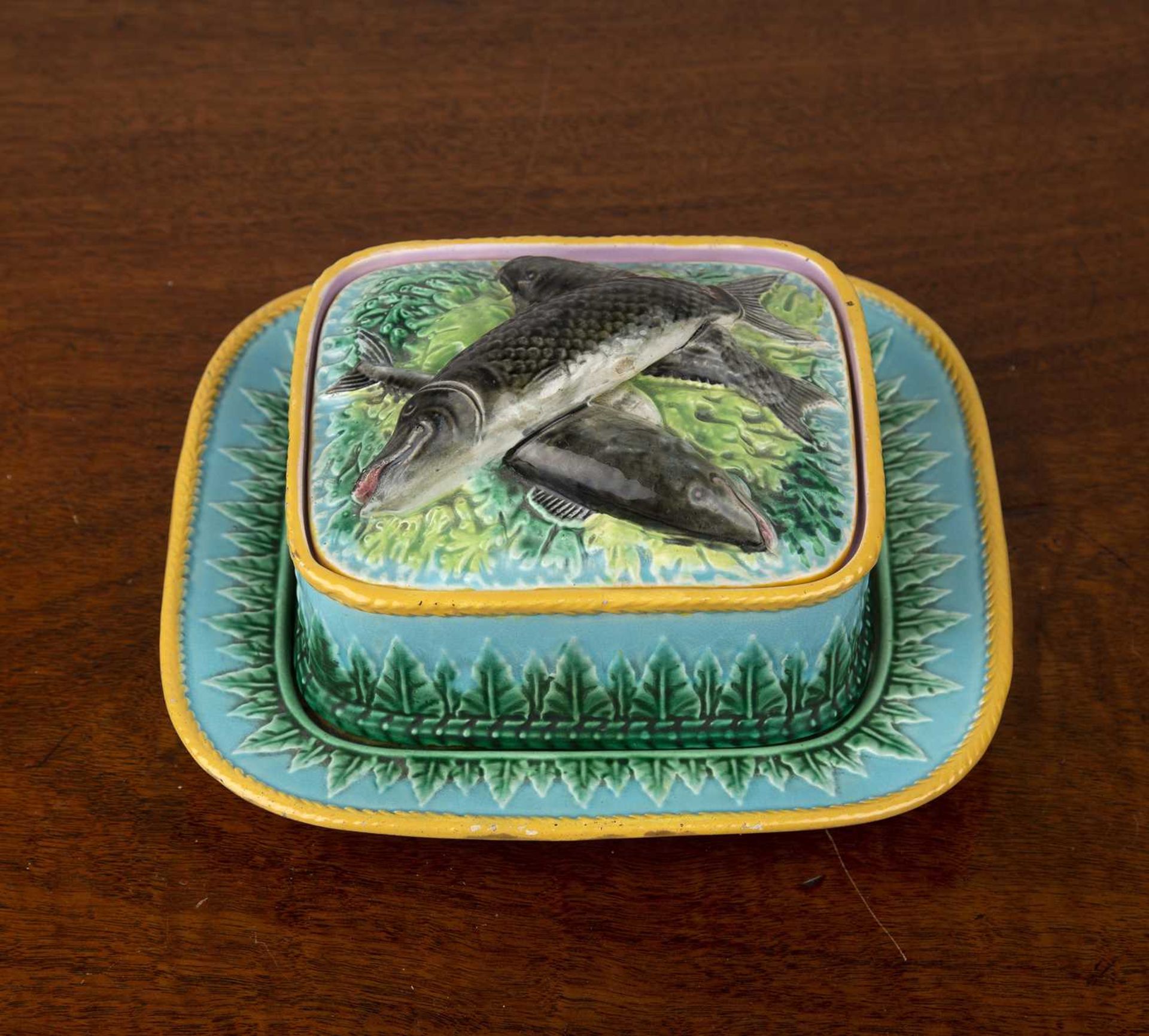 George Jones majolica sardine box, cover, and stand 19th Century, moulded with a band of stiff