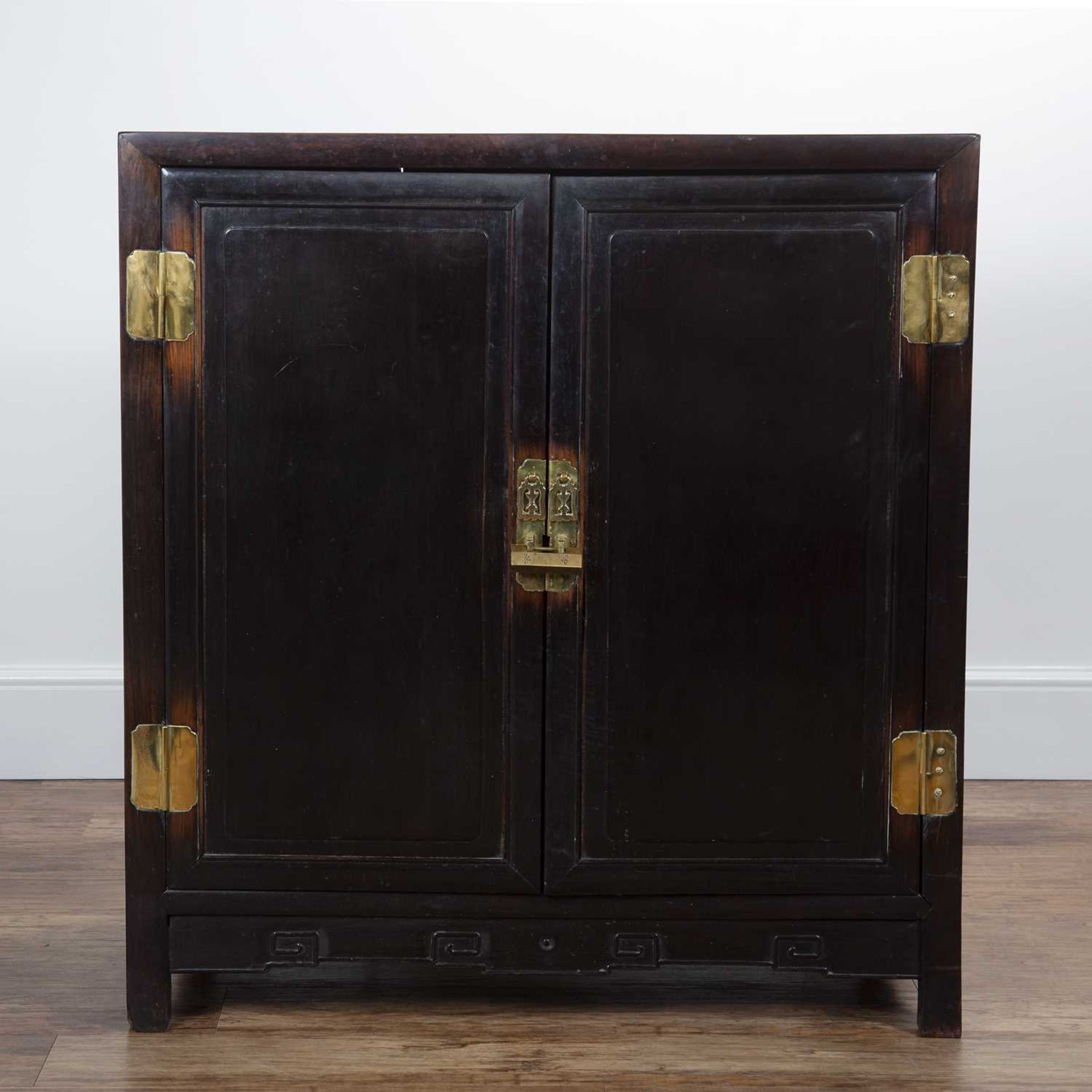 Zitan wood cabinet Chinese, 19th Century, with plain panel doors and with brass locks, 90cm wide x