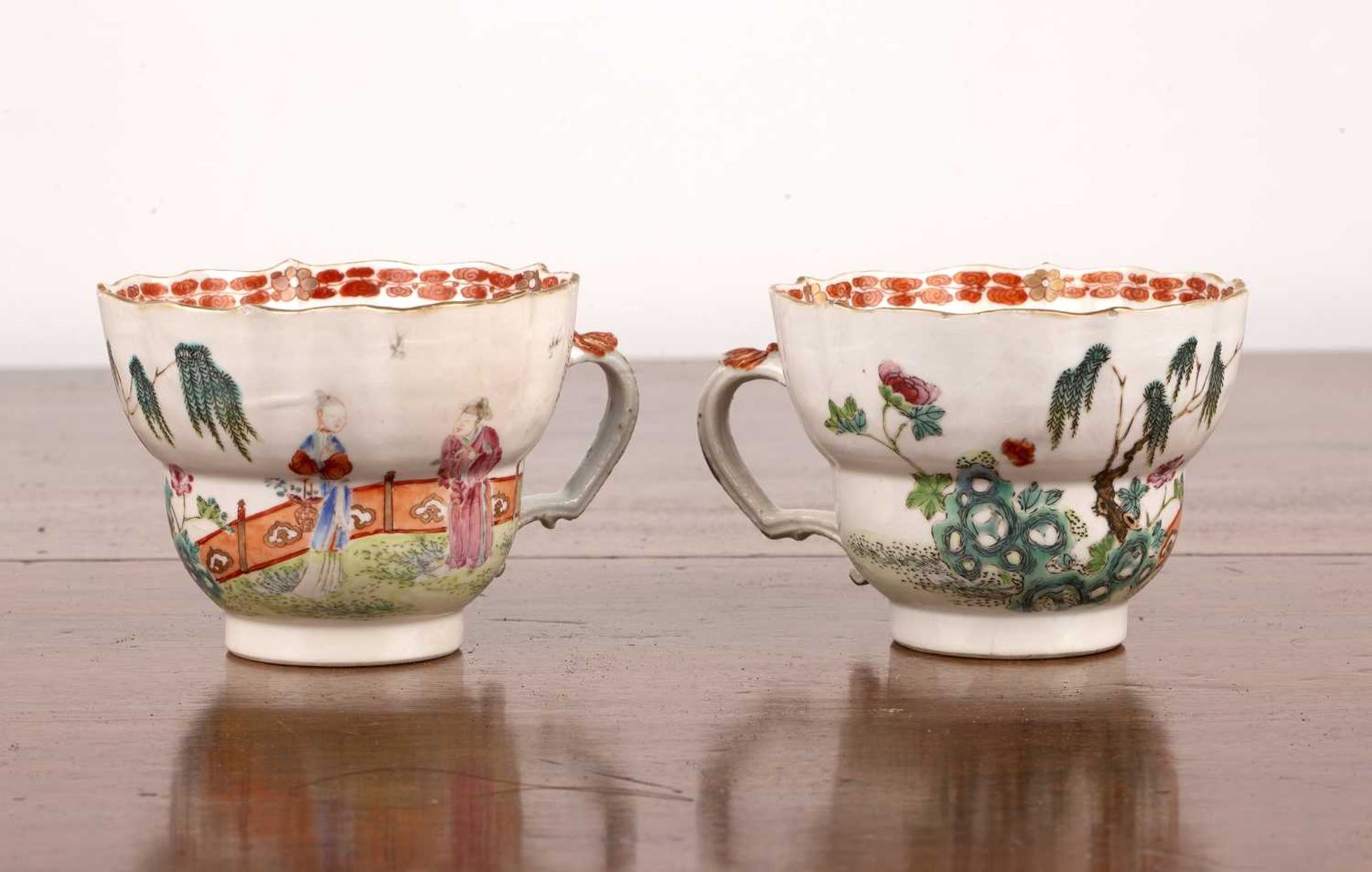 Two Bow soft paste porcelain cups circa 1770, each painted in the Chinese taste with figures in a