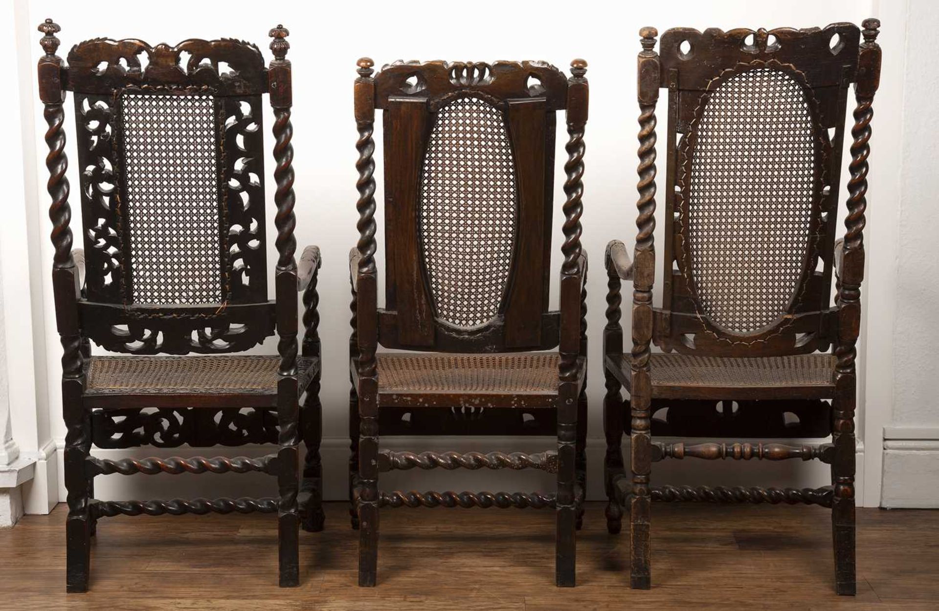 Three similar walnut armchairs Carolean and later, each with carved putti and coronet, and cane - Image 3 of 3