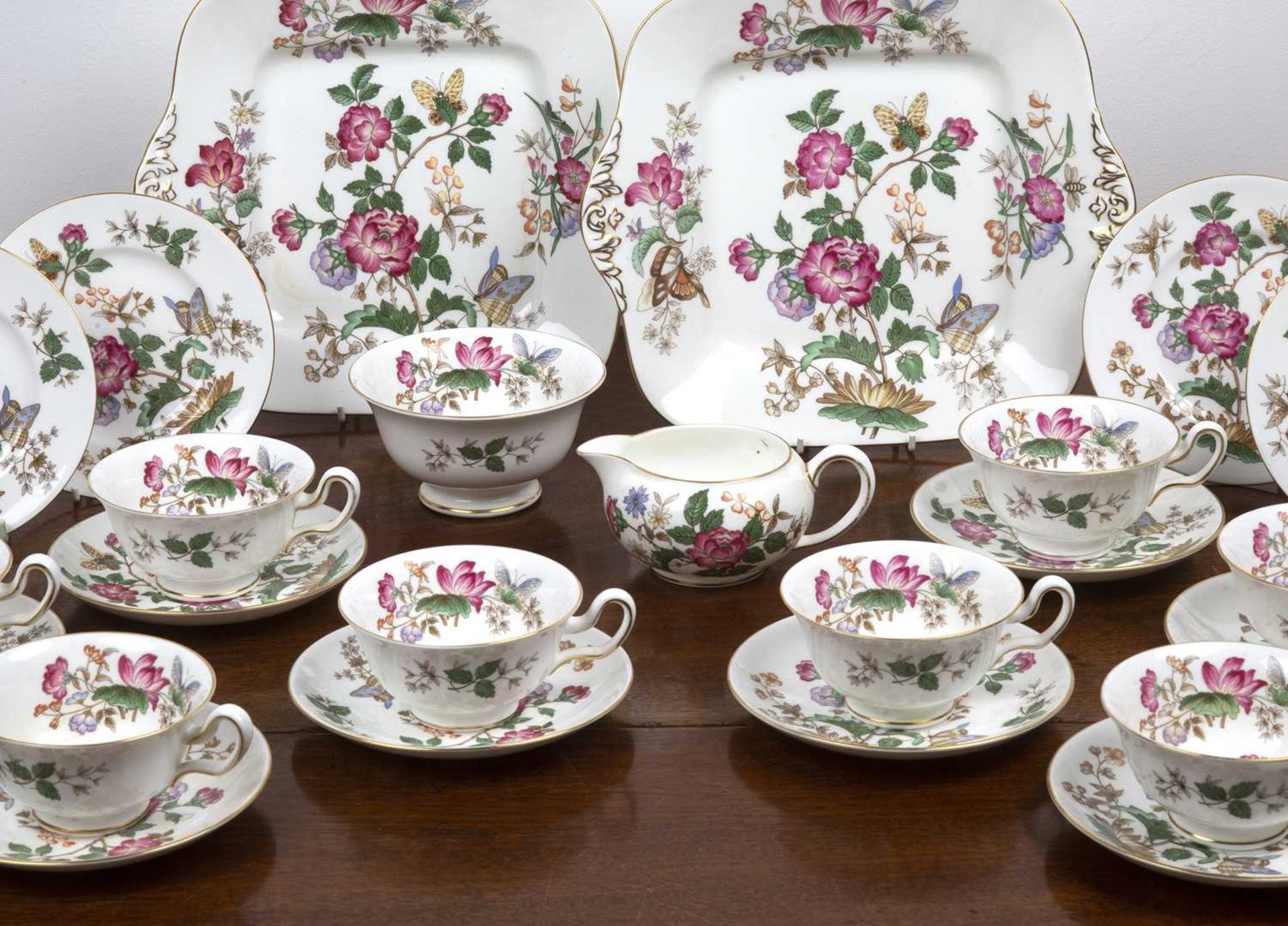 Wedgwood Charnwood pattern tea set to include eight tea cups and saucers, two serving dishes, a milk