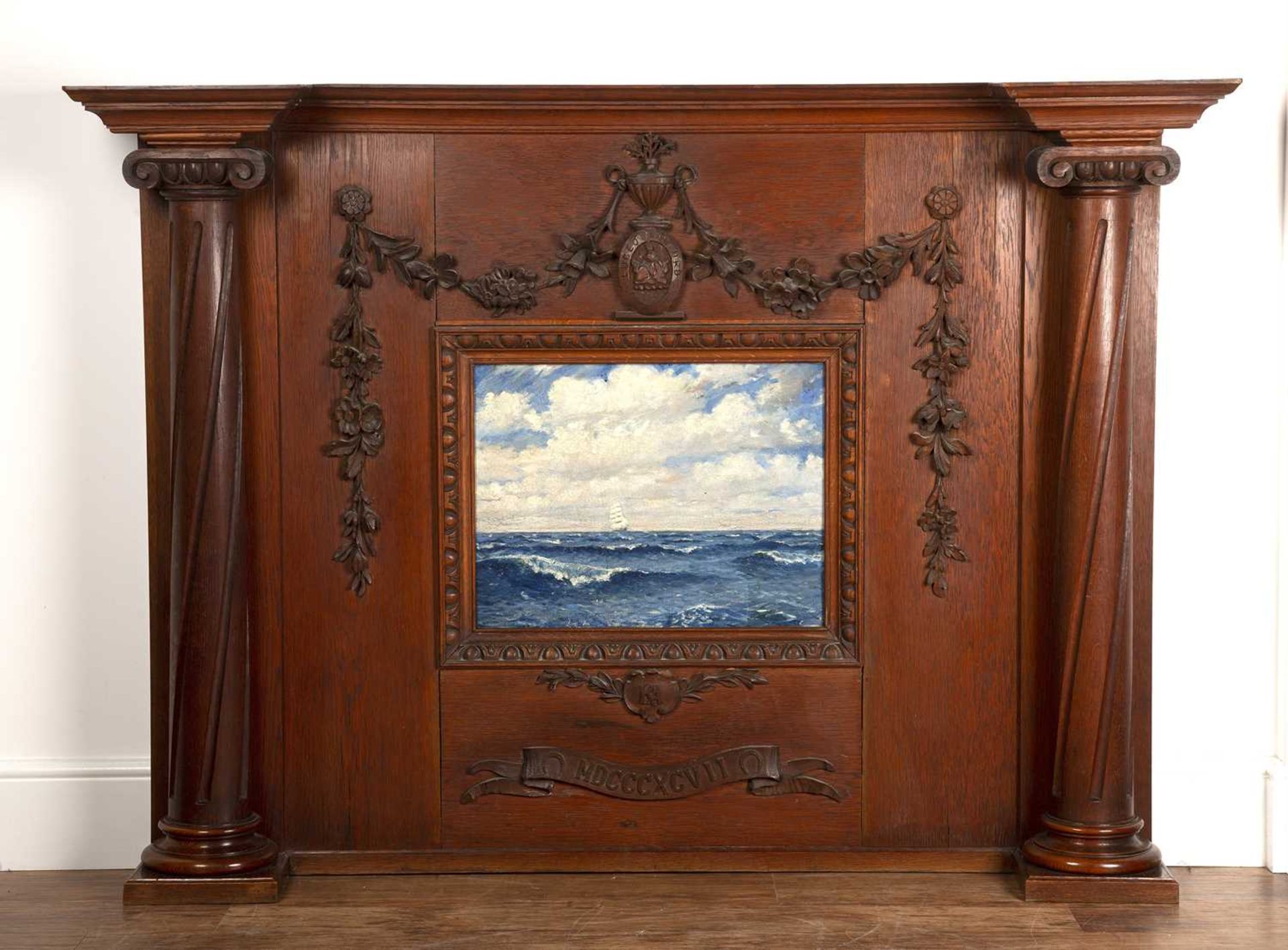 Large oak overmantel with carved swags and central rectangular painted panel depicting a sailing