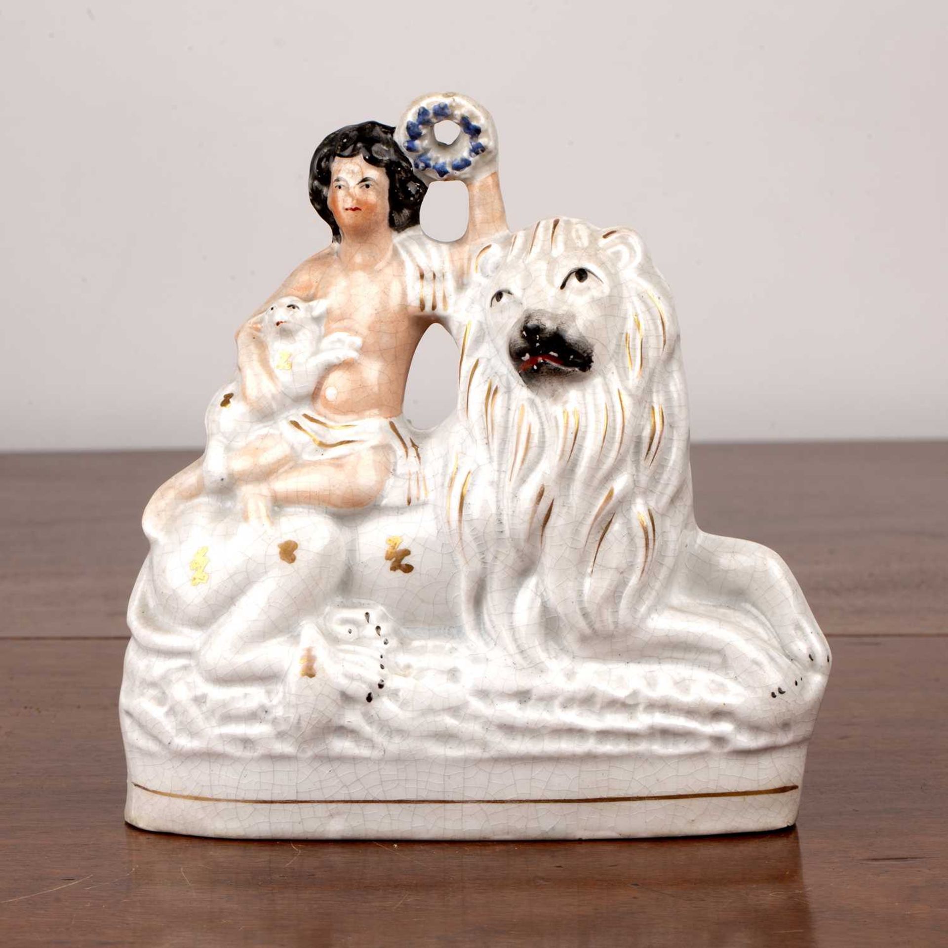 Staffordshire Portrait Figure of The Peaceable Kingdom circa 1870's, depicting a Lion, child and